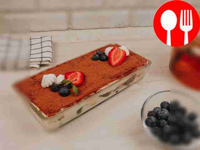 Chess sponge cake with blueberries and curd cheese