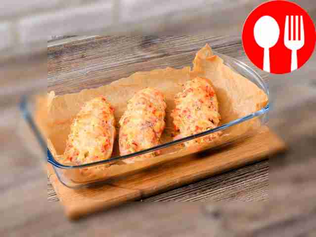 Line a baking dish with parchment. Place...