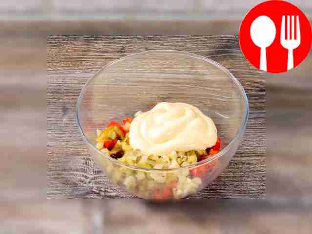 In a deep bowl, combine the fried peppers and...