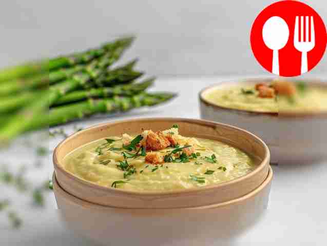 Healthy puree soup from small green asparagus