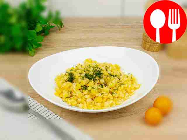 Before serving, sprinkle the peas with finely...