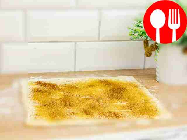 Sprinkle the dough with the cinnamon-sugar mixture.