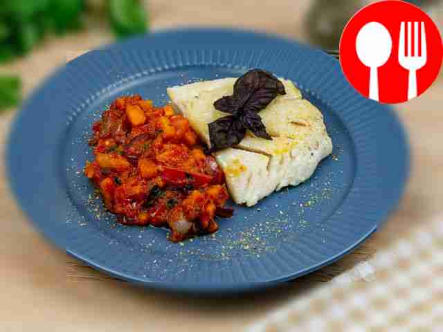 Pike perch with vegetables in tomato sauce in a slow cooker