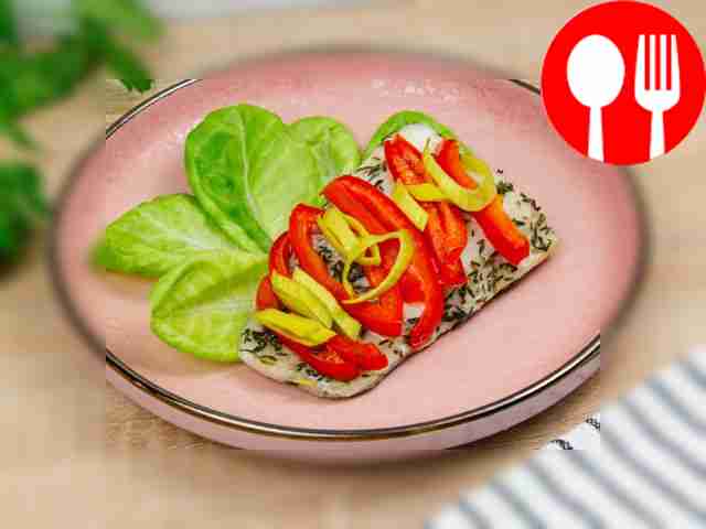 Spicy pike perch with vegetables in parchment