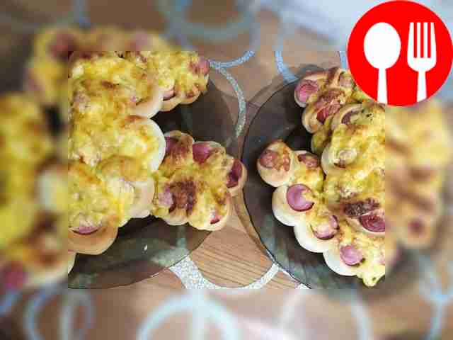 Sausages in dough with cheese crust