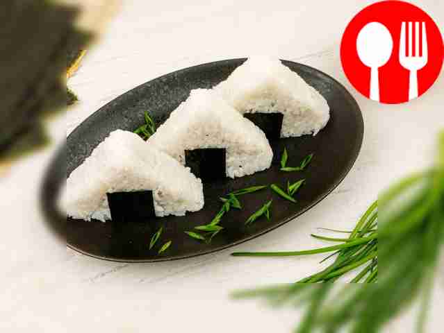 Wrap each onigiri in a strip of nori, place on...