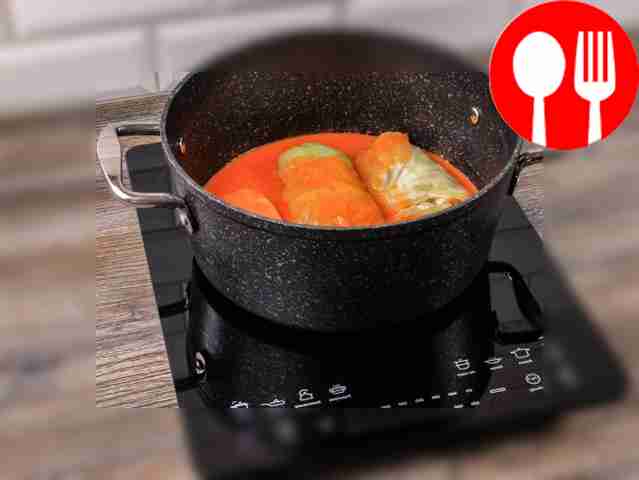 Place the cabbage rolls in a saucepan and pour...