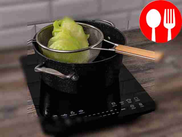 Drain the cabbage leaves in a colander or...