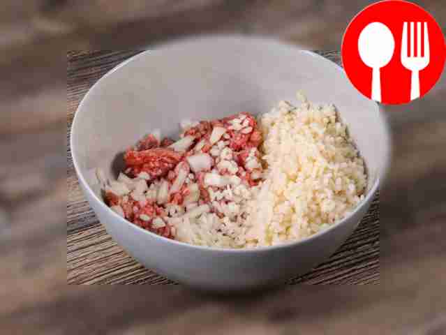 In a deep bowl, combine minced meat, rice and...