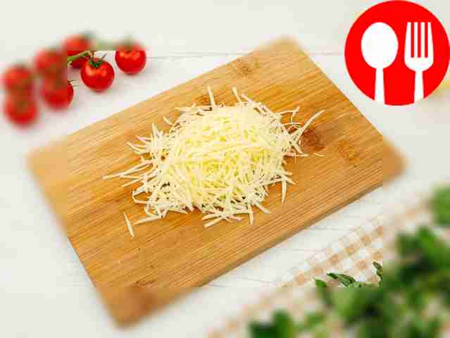 Grate the cheese on a coarse grater.