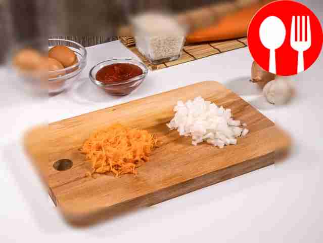 Finely chop the onion and grate the carrots on...