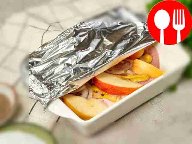 Bake the chops. Grease a baking sheet with...