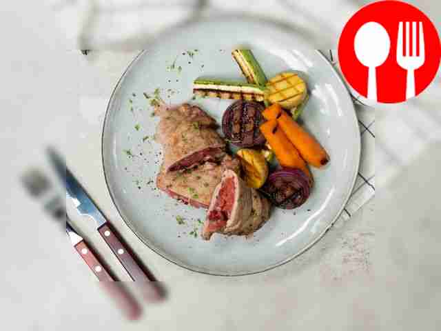 Place the finished chops with lingonberries on...