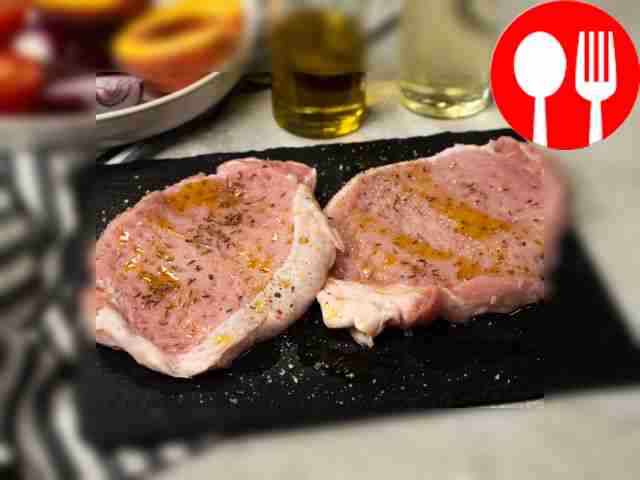 Prepare the chops. Grease the pieces of meat...