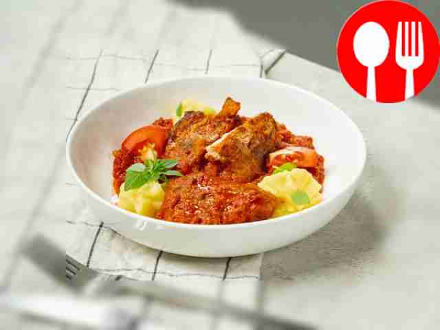 Chop with tomato sauce