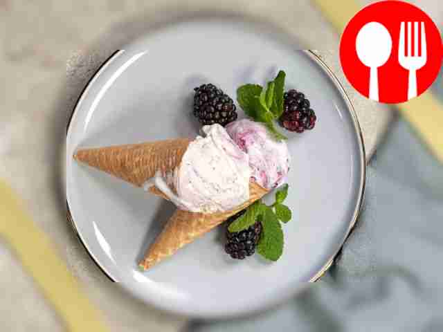 Before serving, garnish the sundae with fresh...