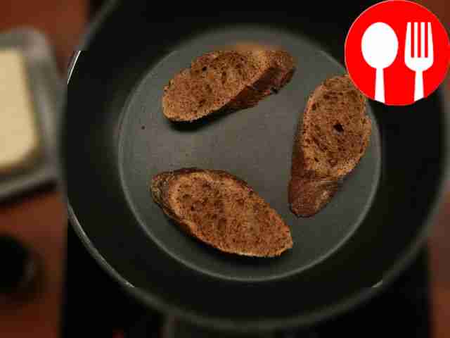 In a dry frying pan, fry the bread slices...