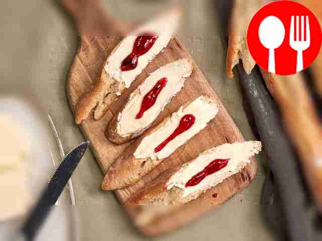 Serve the baguette hot, cut into slices and...