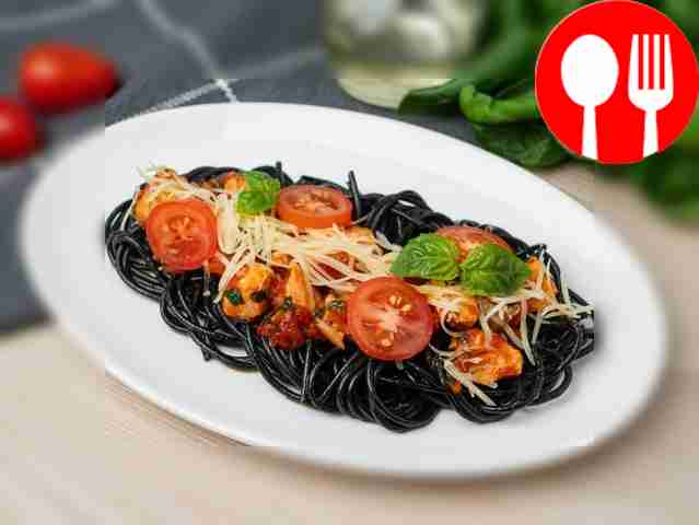 Spaghetti with salmon in tomato sauce