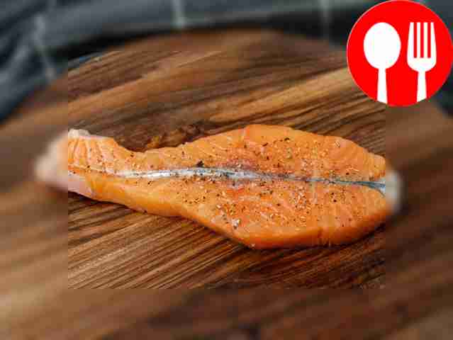 Salt and pepper the fish on both sides.