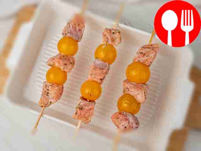 Place the fish on skewers alternately with the...