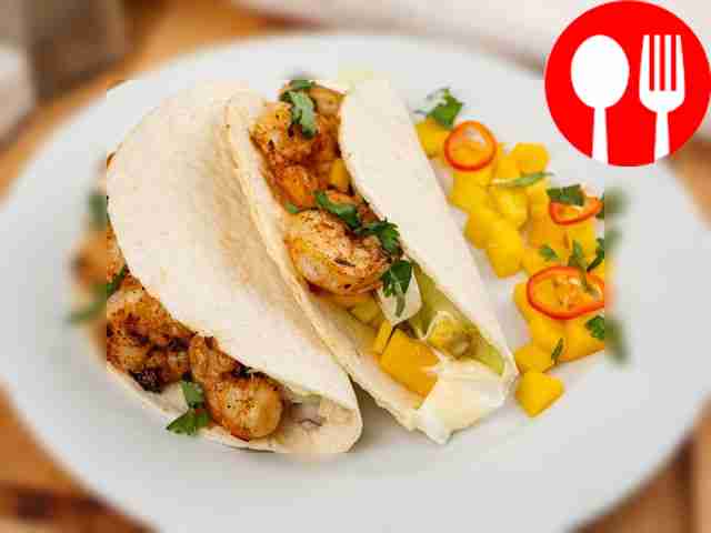 Warm the taco tortillas in the oven for 4-5...