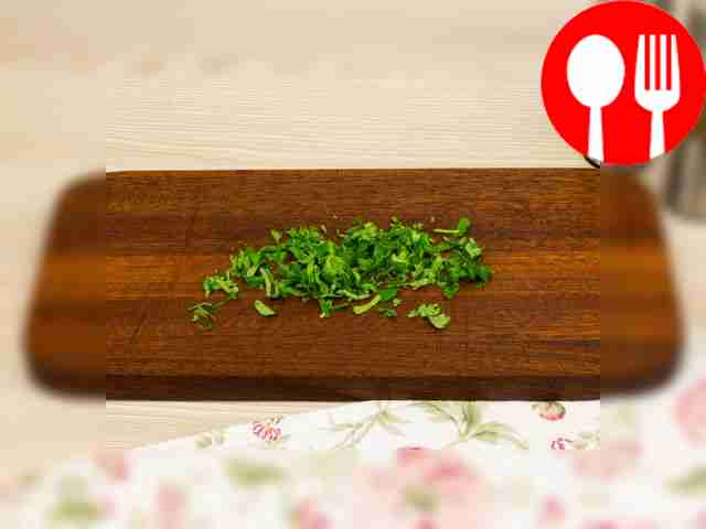 Finely chop a couple of parsley sprigs. Cut...