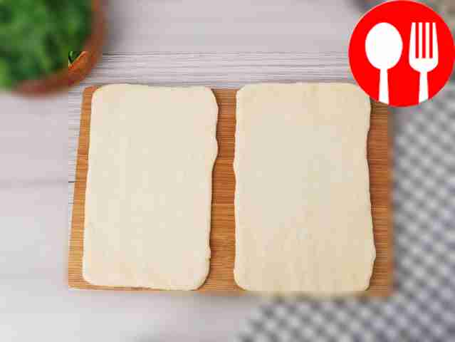 Roll out the puff pastry to double its size....