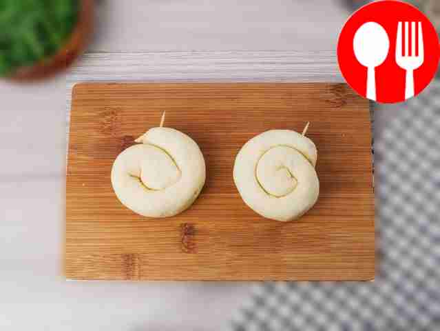 Form buns. To do this, roll the dough with the...