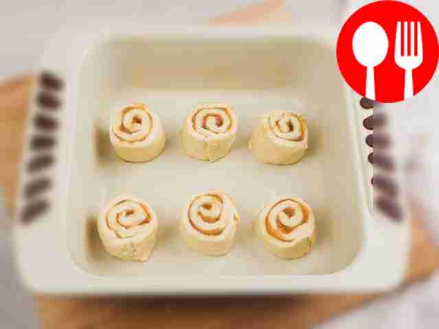 Roll the dough into a roll and cut it into...