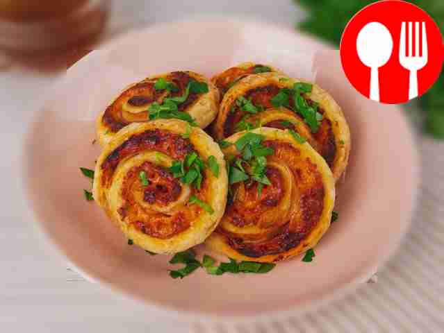 Snails with bacon, tomato paste and cheese