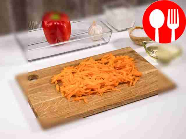 Grate the carrots on a coarse grater or cut...
