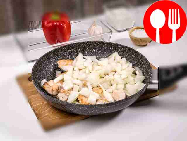 Add onion to chicken and reduce heat to...