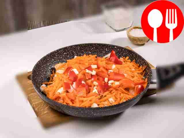Add chopped garlic and bell pepper to the...