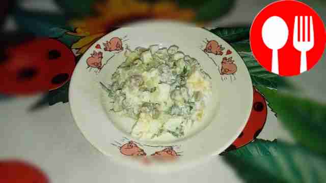 Hearty salad of potatoes, green peas and eggs with herbs