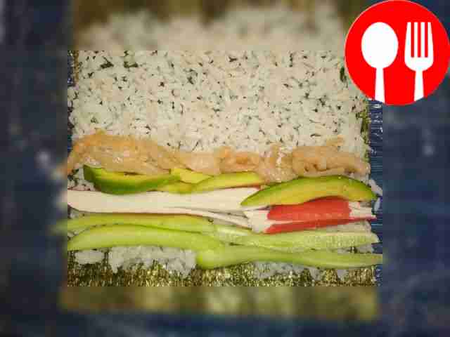 Place nori on a mat wrapped in cling film....