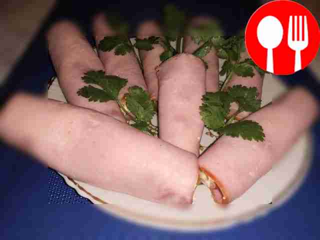 Place ham rolls on a platter. Decorate them...