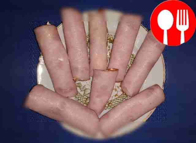 Appetizing ham rolls with cheese and Korean carrots