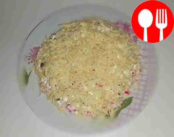 Spectacular salad of crab sticks, olives and cheese