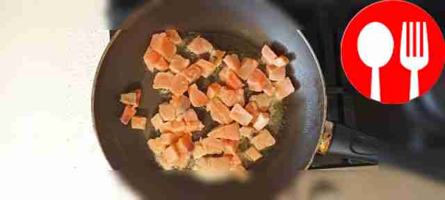 Place the chopped salmon in a frying pan and...