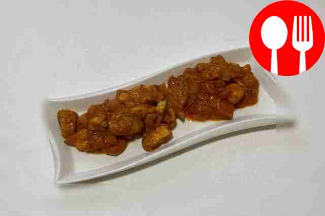 Before serving, garnish the dish with herbs...