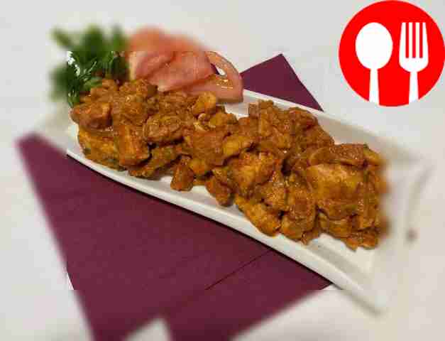 Healthy salmon in tomato sauce with shrimp