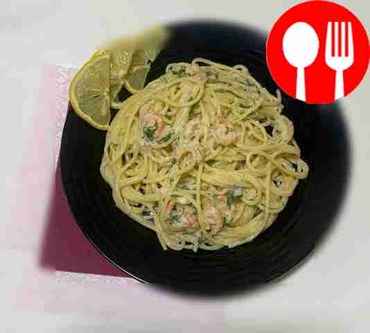 Noodles in creamy sauce with shrimp