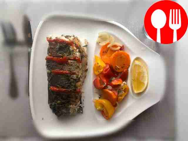 Baked sea bass with vegetables