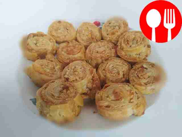 Homemade buns with nut crumbs and cheese