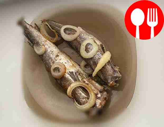 Baked hake in soy sauce with lemon