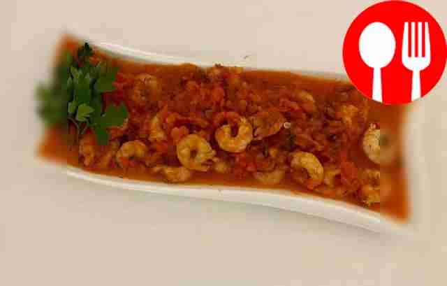 Shrimps with tomatoes and bell peppers