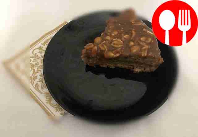 Cake with peanuts and condensed milk in a slow cooker