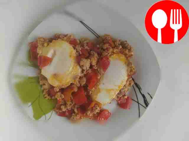 Shakshuka with vegetables and minced chicken