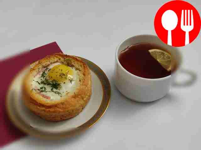 Baked crispy buns stuffed with ham and eggs